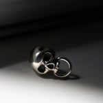 Skull stud earring with door knocker hoop