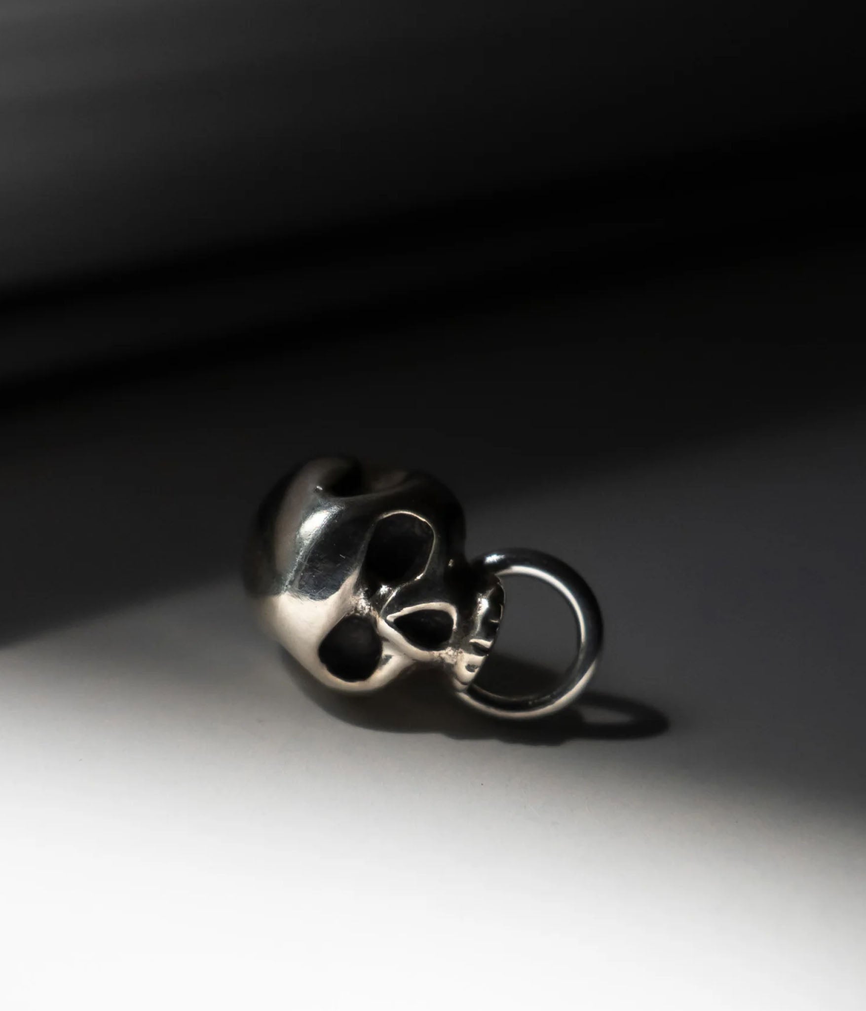 Skull stud earring with door knocker hoop