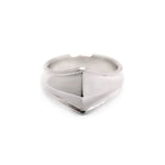 Silver ring with a geometric design on a white background