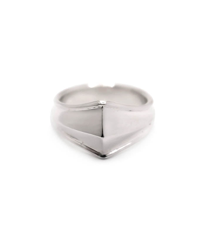 Silver ring with a geometric design on a white background