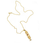 Gold necklace with a detailed pendant on a white background