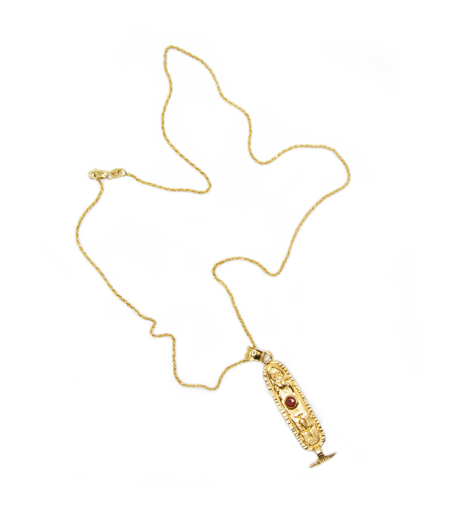 Gold necklace with a detailed pendant on a white background