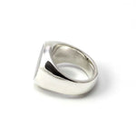 Silver ring on a white background