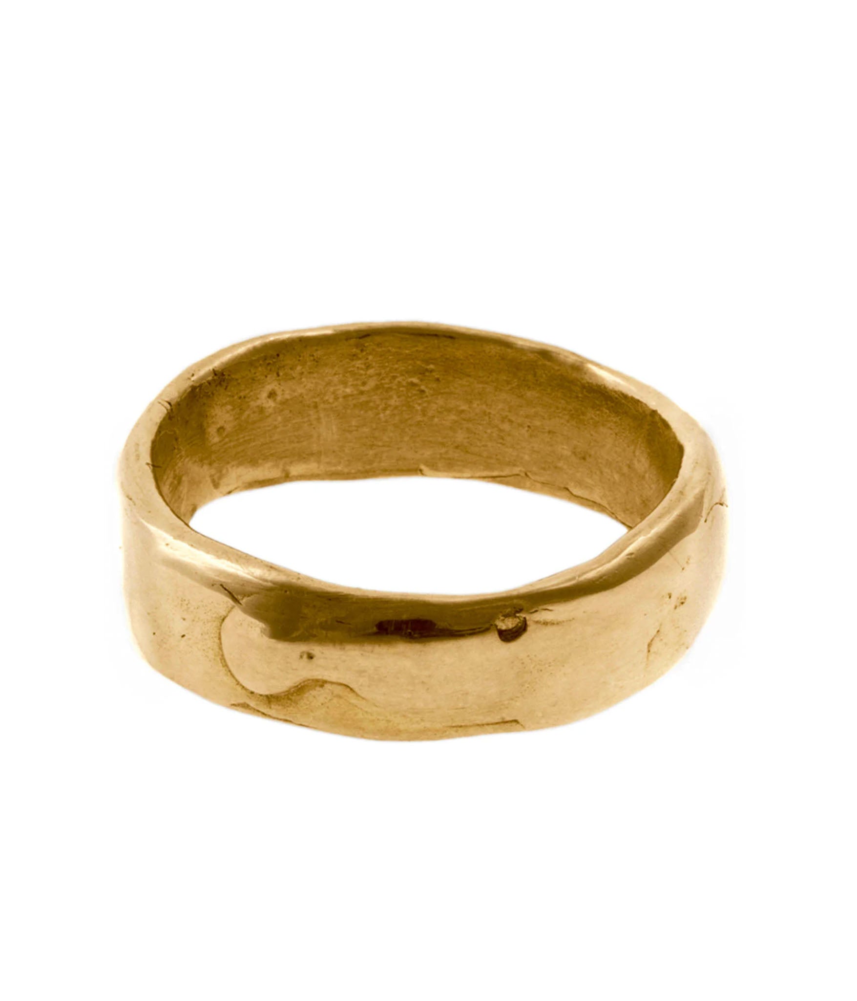 Gold ring on a white background