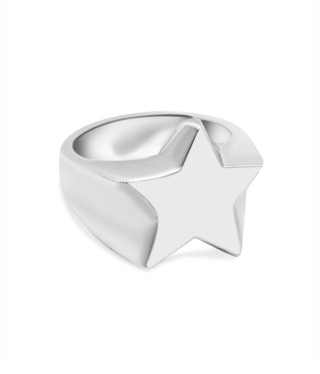 Silver star-shaped ring on a white background