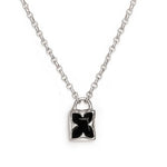Necklace with a black butterfly pendant on a white background