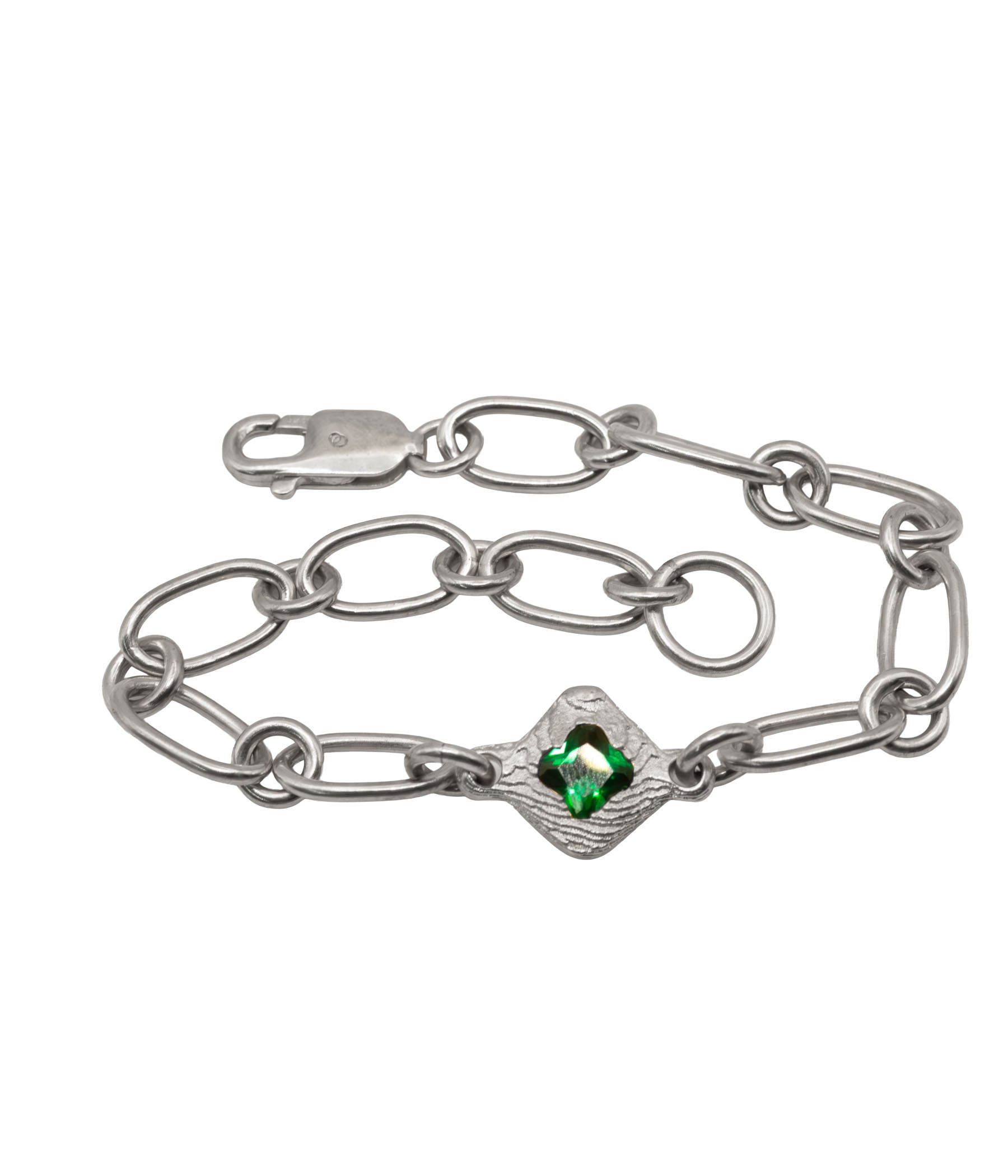 Silver chain bracelet with a green gemstone on a white background