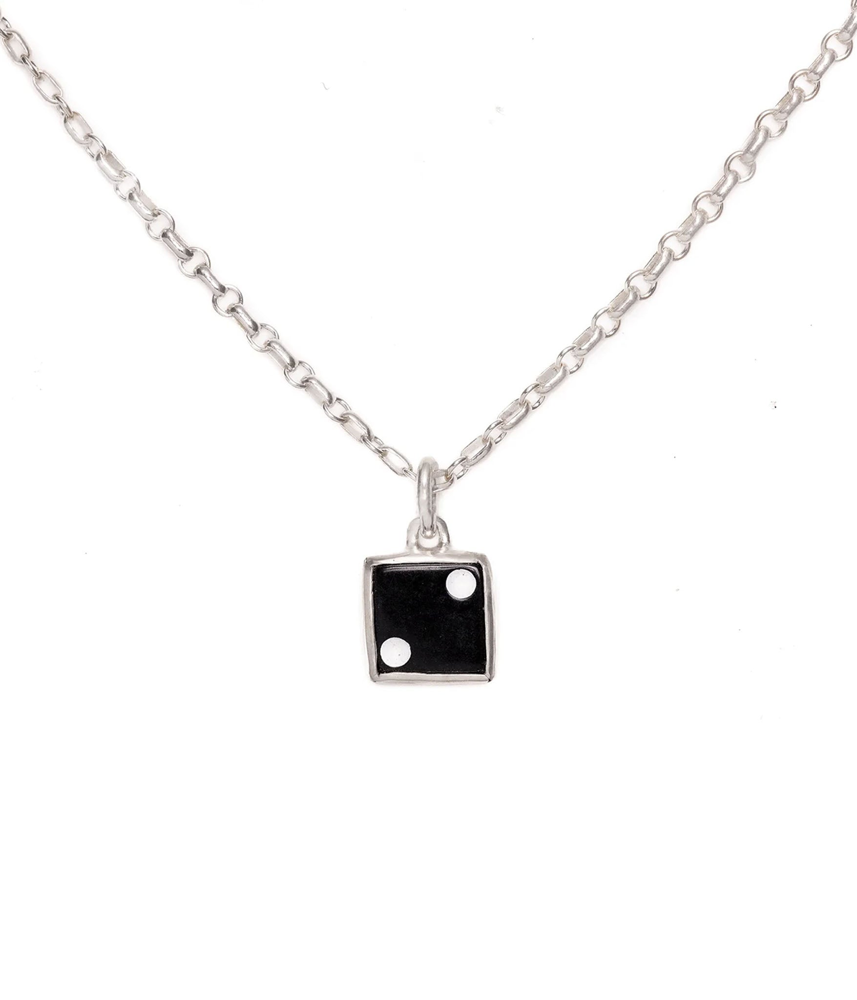 Necklace with a square pendant featuring two small circles on a white background
