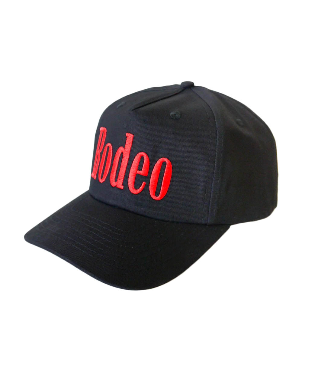 Black cap with red 'Rodeo' text on a white background