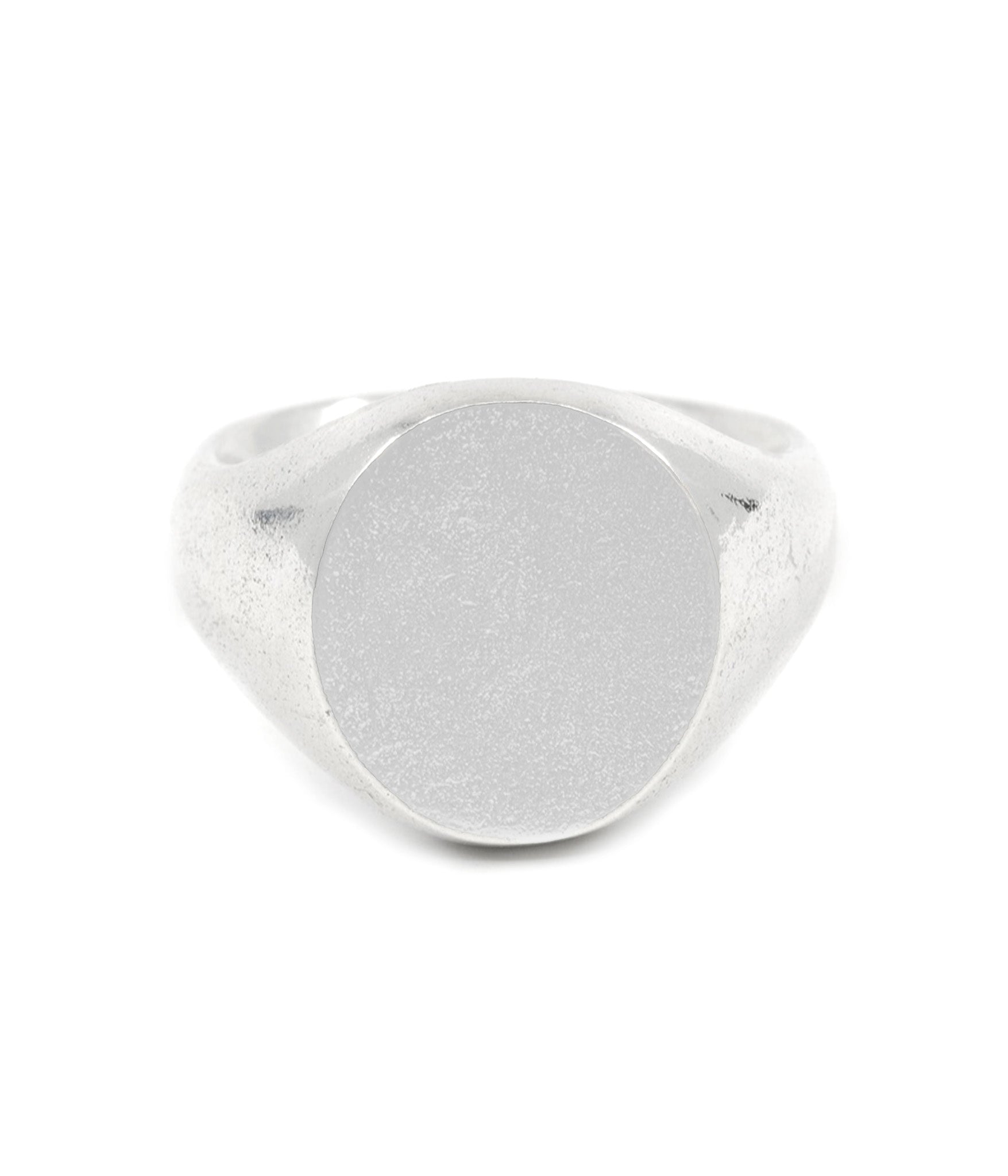 Silver signet ring on a white background