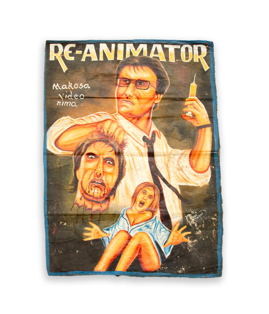 Vintage 'Re-Animator' movie poster with a horror scene on a white background