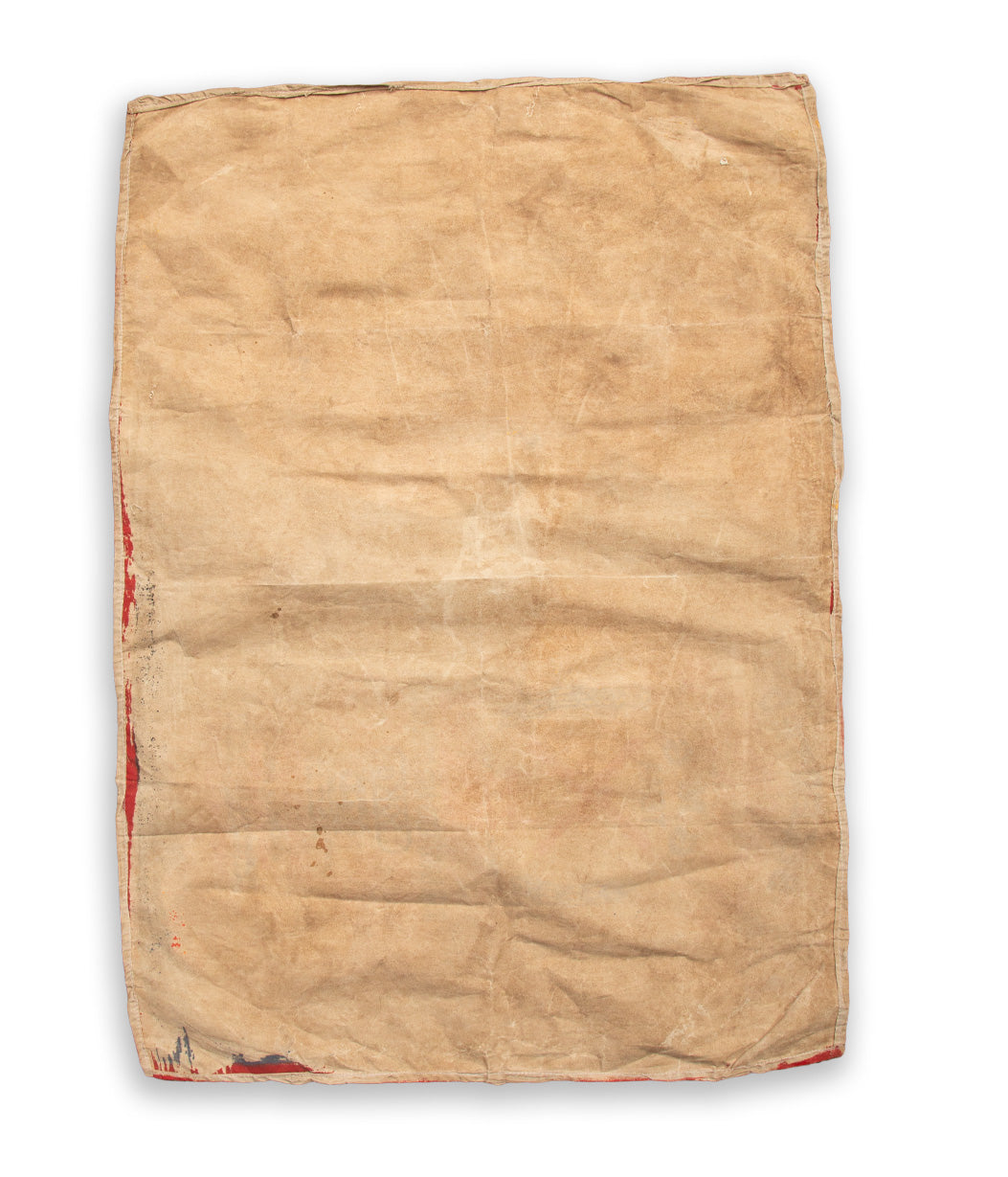 Beige fabric bag with red accents on a white background