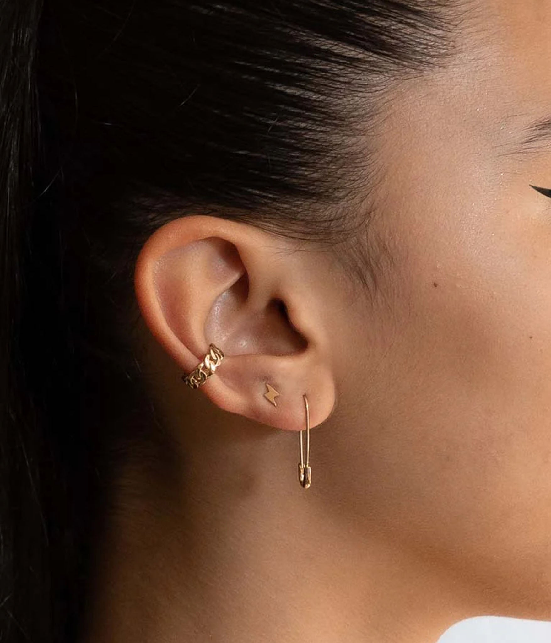 gold Miami ear cuff on model 