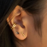 bar earring on ear