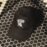 snake hat on tile