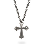 Silver cross necklace on a white background