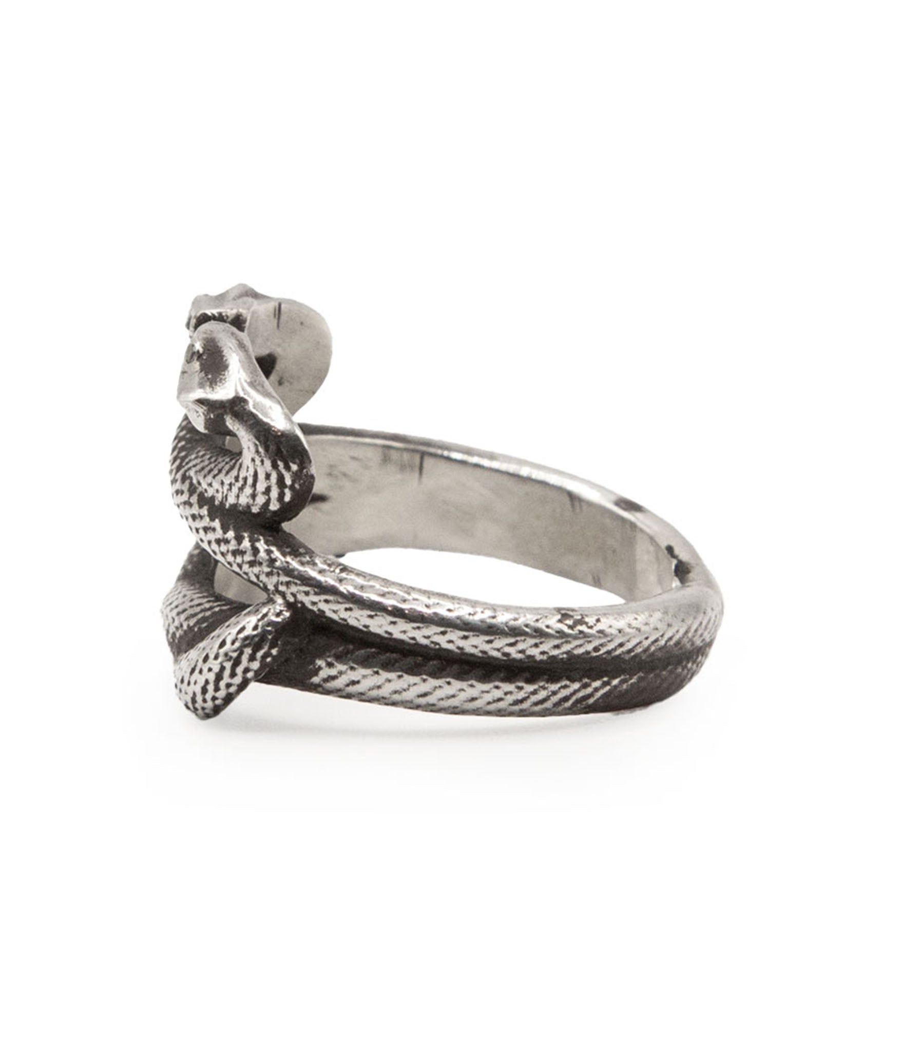 Silver snake-shaped ring on a white background