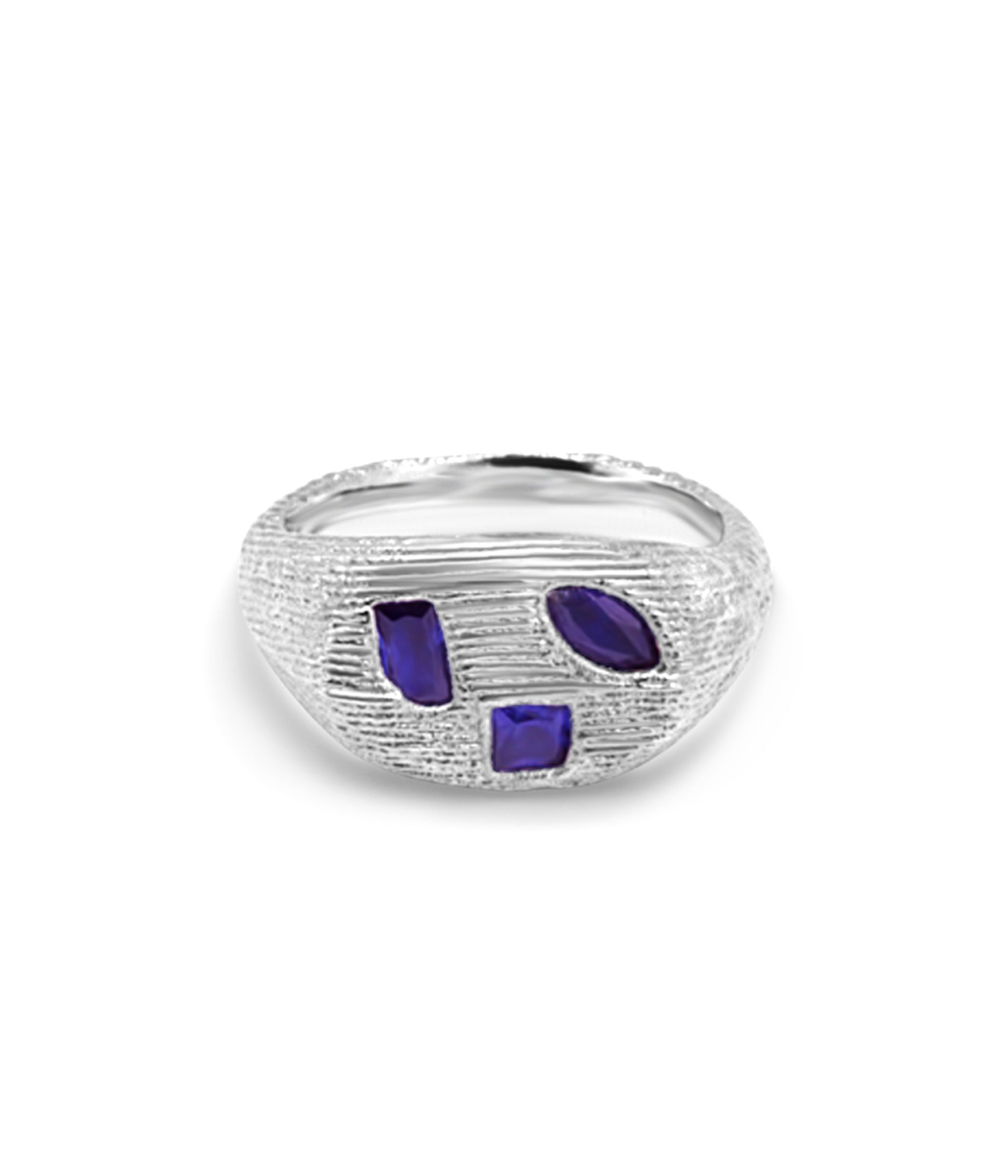 Silver ring with purple stones on a white background