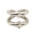 Silver knot-shaped ring on a white background