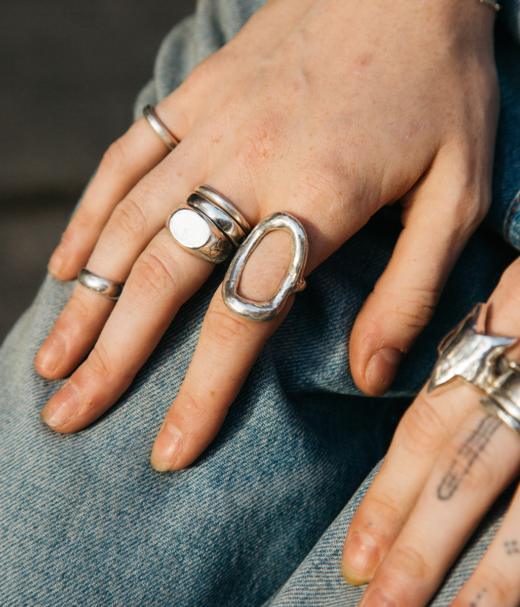 silver void ring on hand