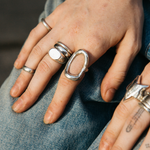 silver void ring on hand