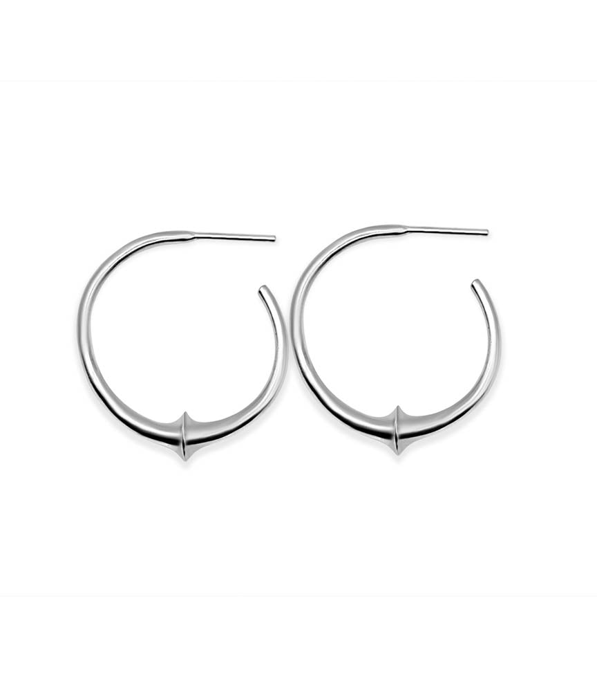 Pair of silver hoop earrings on a white background