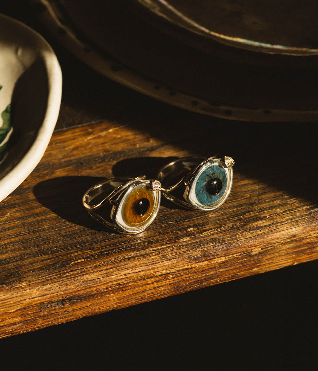 two hand painted eye rings
