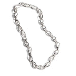 Silver chain necklace on a white background
