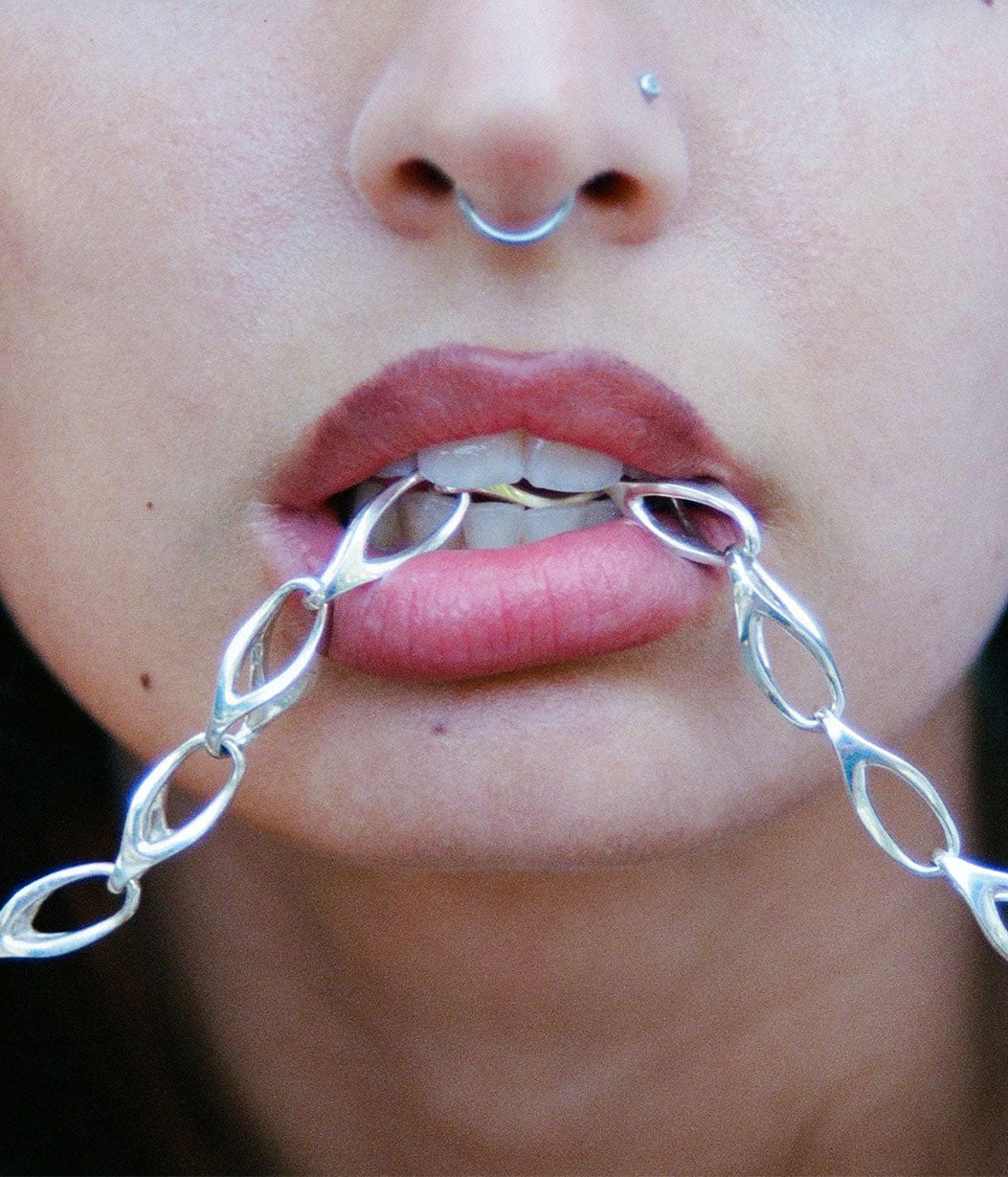 wishbone necklace  in mouth