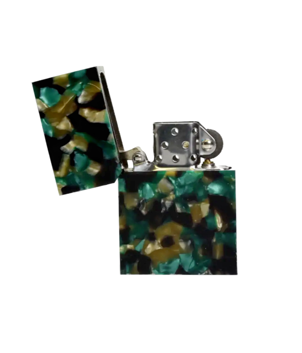 Zippo lighter with a colorful pattern on a white background