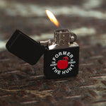 Lighter with a design and text on a textured surface