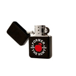 Black lighter with red apple graphic and text on a white background
