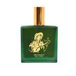 Green perfume bottle with gold cap on a white background