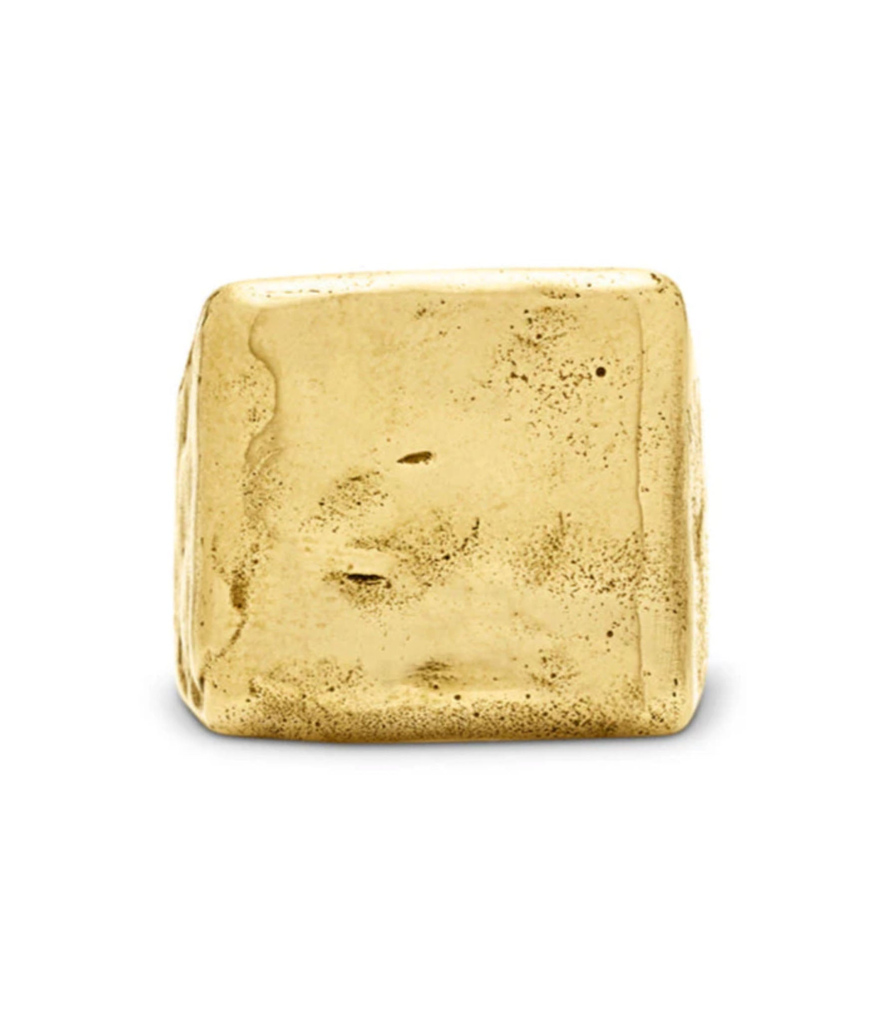 Gold-colored cube on a white background