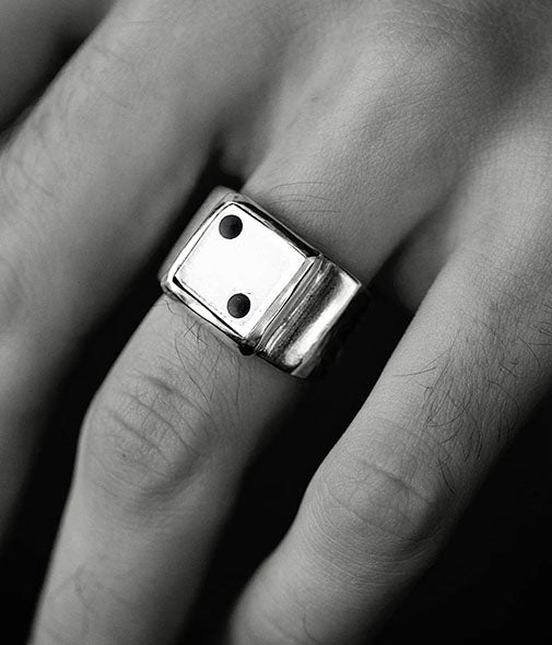 lucky dice ring on hand 