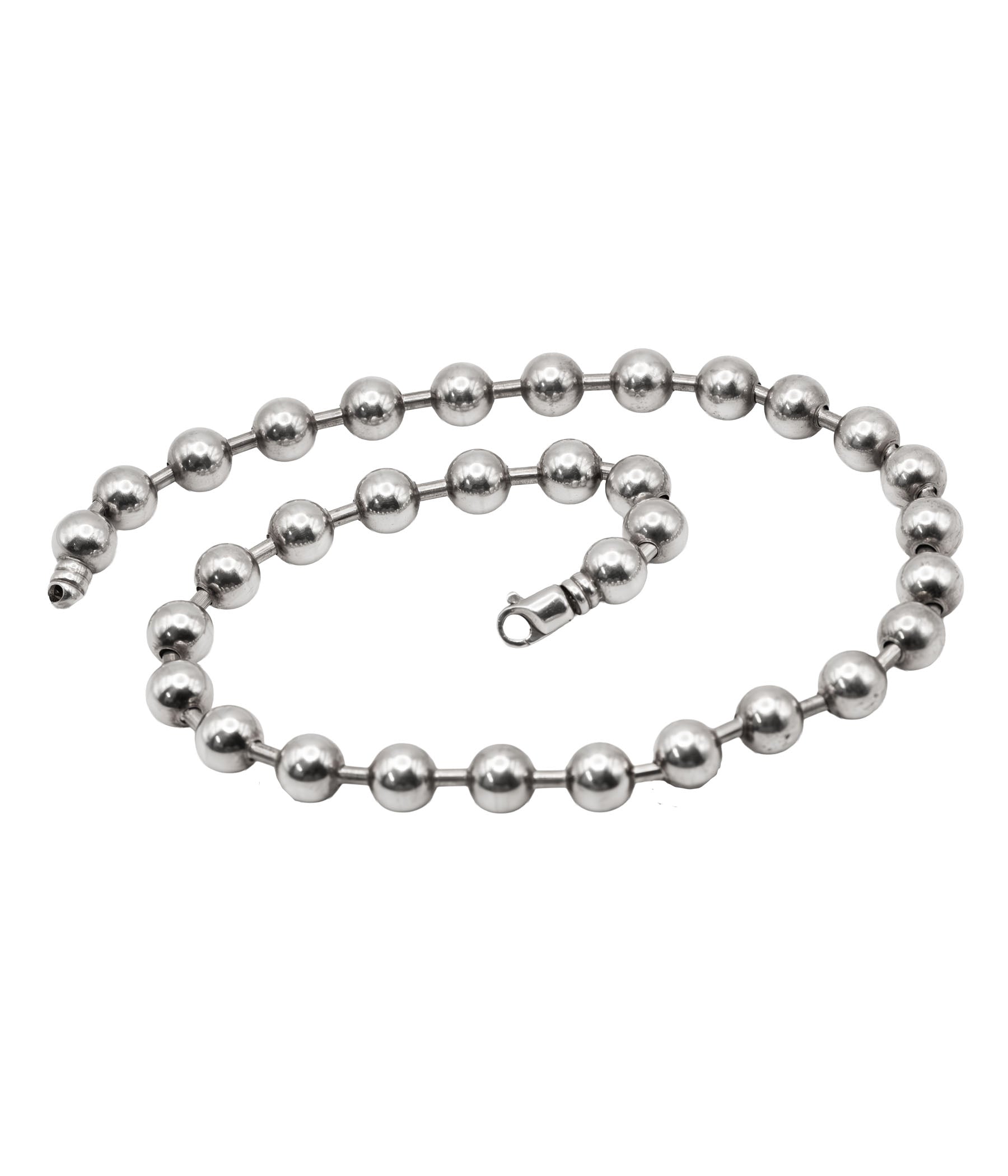Silver beaded necklace on a white background