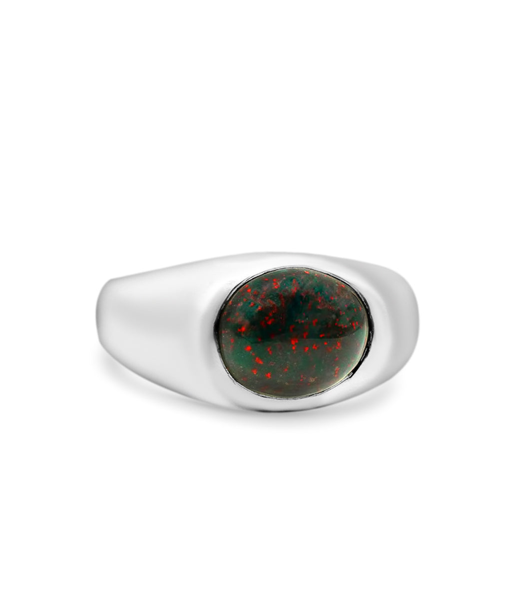 Silver ring with a bloodstone gemstone on a white background