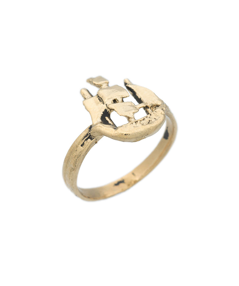 Gold ring with anchor design on a white background