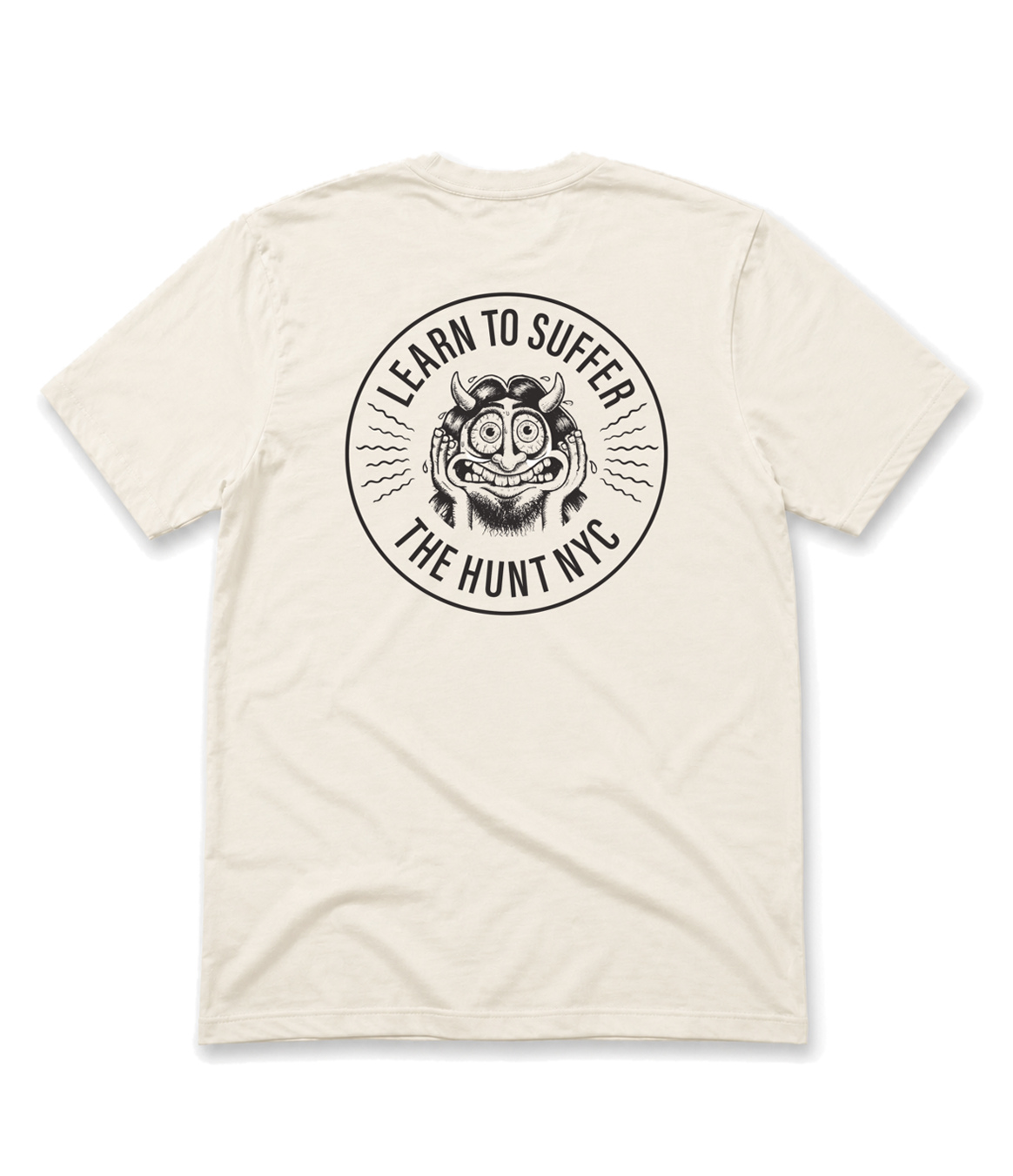 An off-white short-sleeve t-shirt shown from the back, featuring a large black circular graphic print with a cartoon monster face and the text 'LEARN TO SUFFER' and 'THE HUNT NYC'.