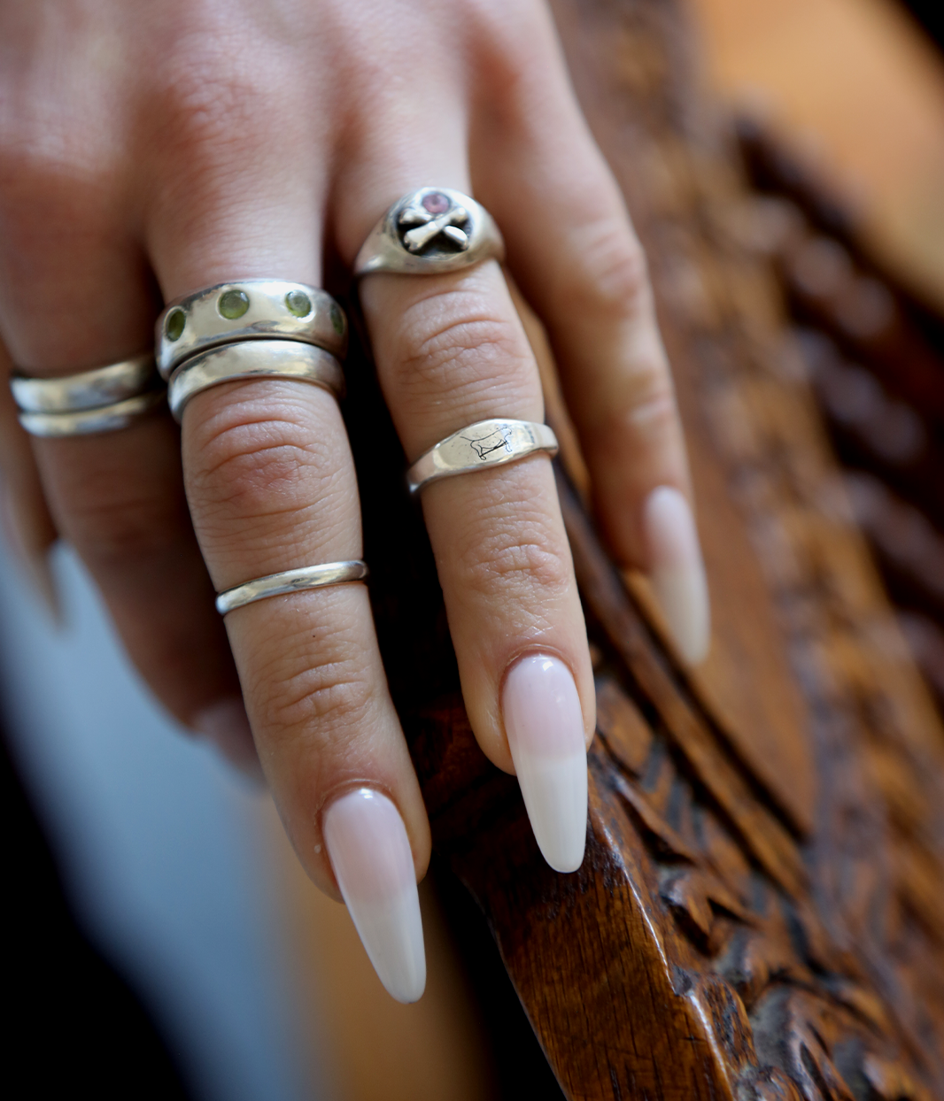 small signet ring on hand