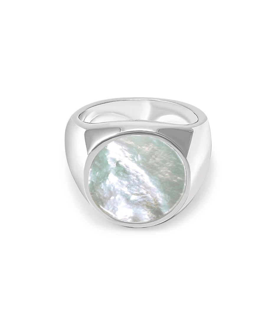 Silver ring with a circular gemstone on a white background