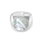Silver ring with a circular gemstone on a white background