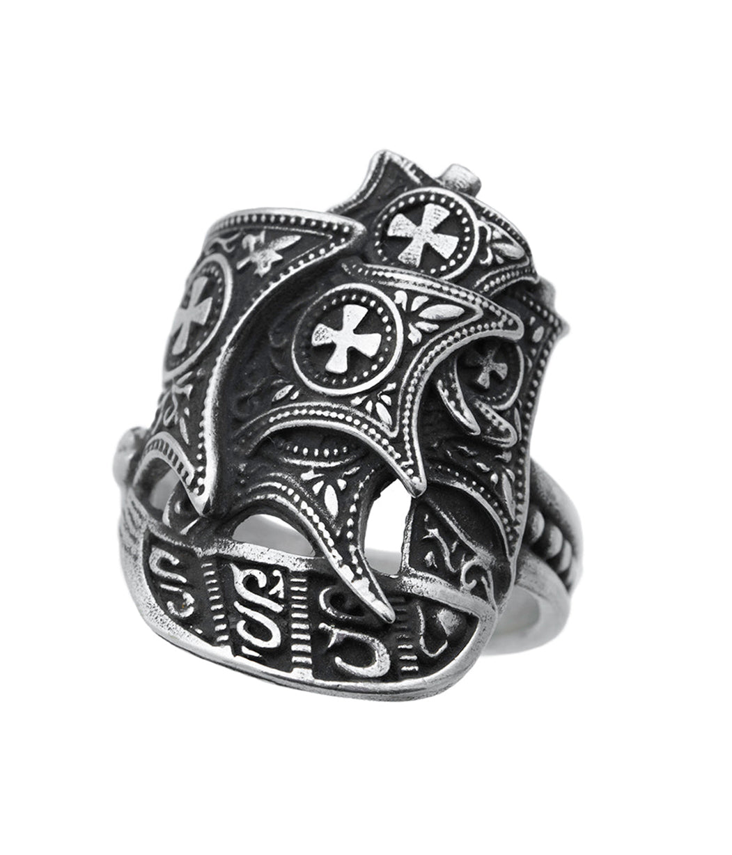 Silver ring with intricate designs and cross patterns on a white background