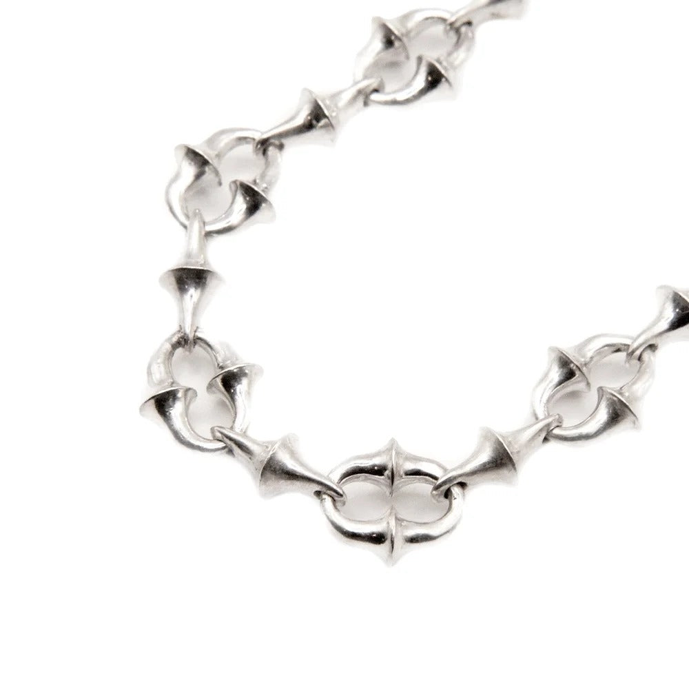 Silver chain bracelet on a white background