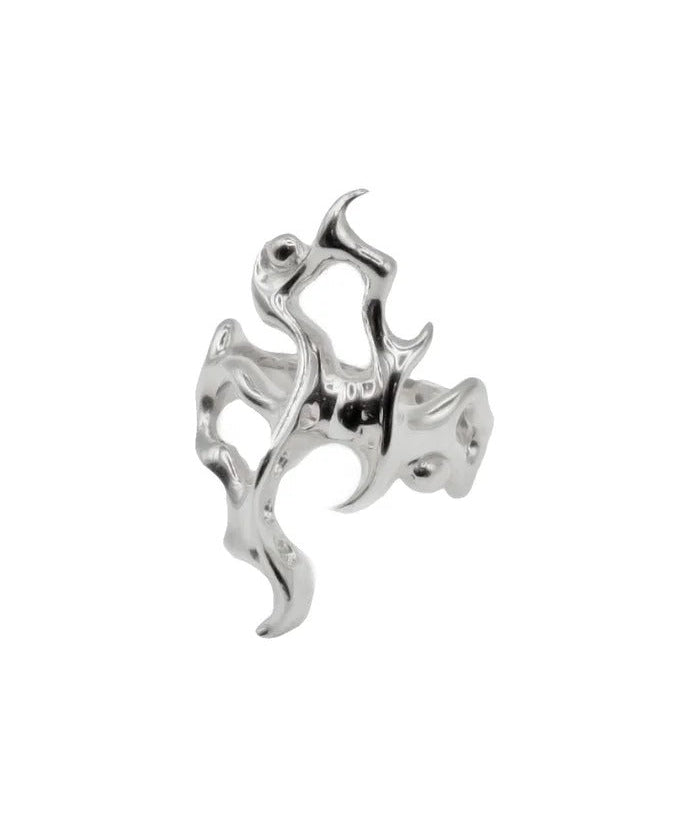 Silver dragon-shaped ring on a white background